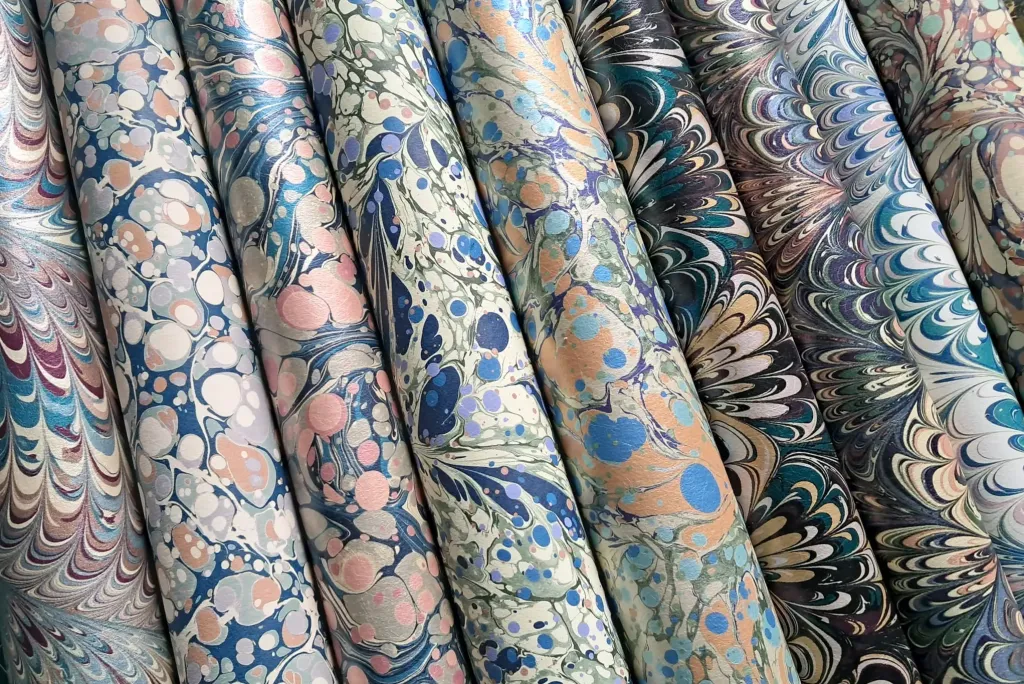 House of Estila featuring House of Amitie marbled wallpaper